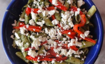 Pasta with pesto, roasted peppers, and feta