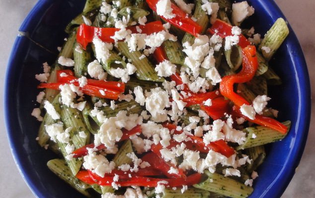 Pasta with pesto, roasted peppers, and feta