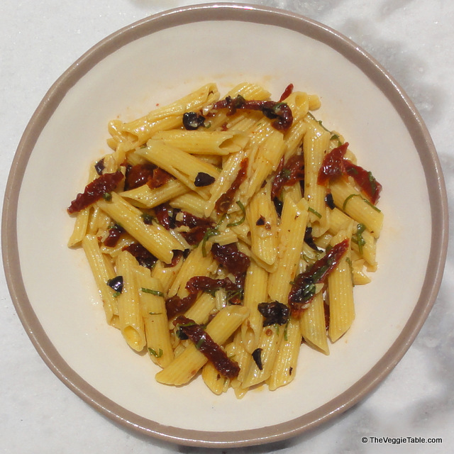Penne with tomatoes and olives